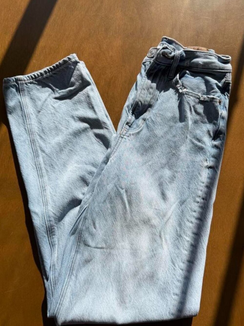 American Eagle light wash high-waisted straight leg jeans, size 0